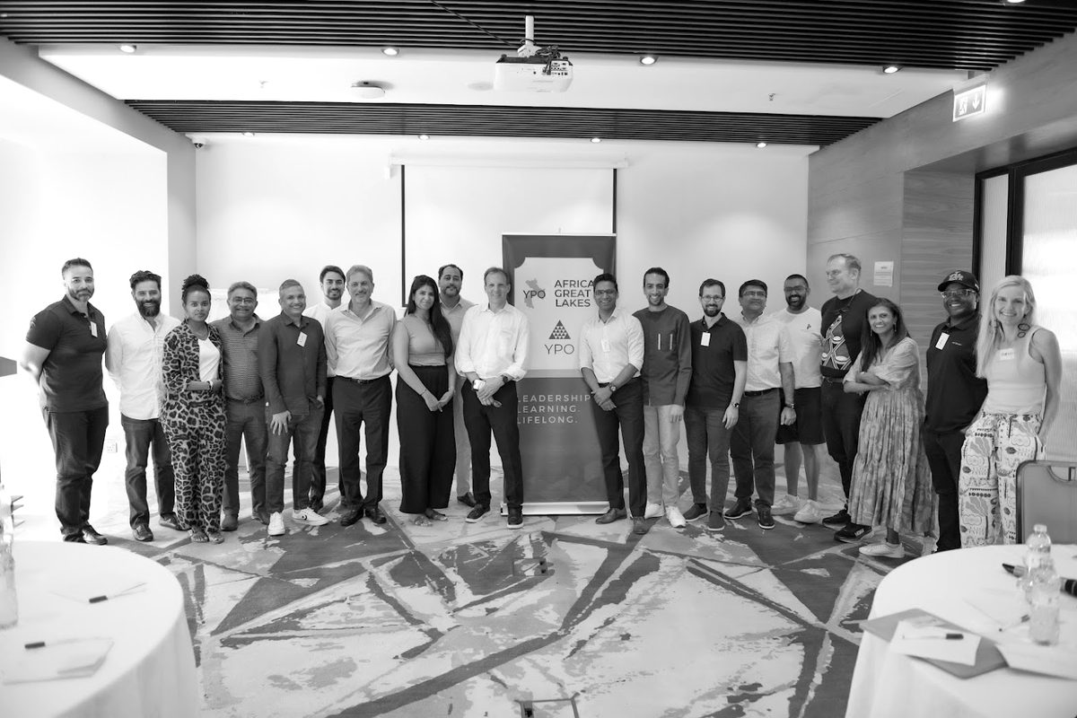 Business leaders from YPO Africa Great Lakes with Simon Greenman after an AI workshop